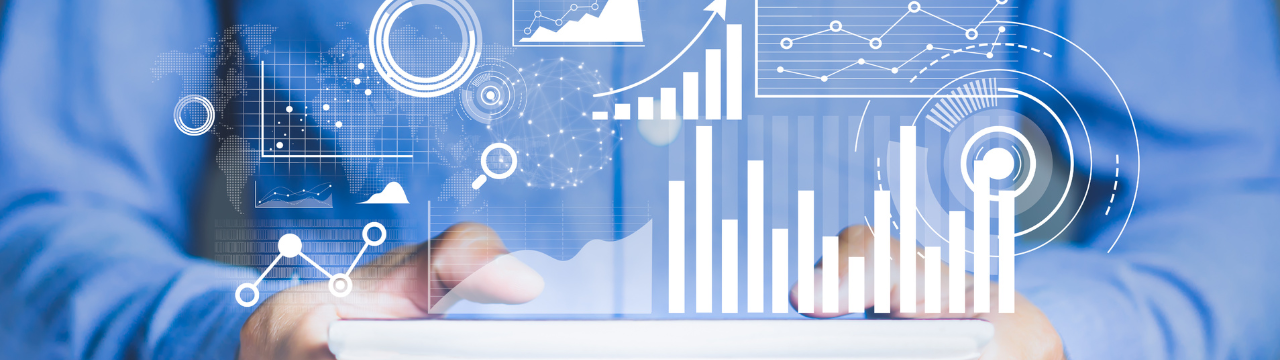 Man with blue shirt holding tablet showing mirrored data.